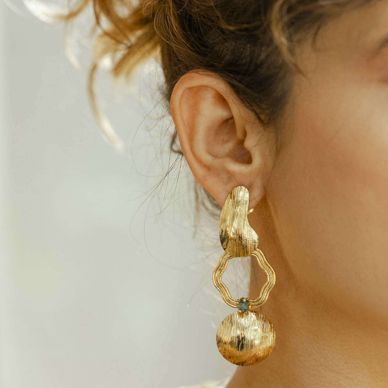 Aretes Emblema