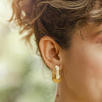 Aretes Emblema